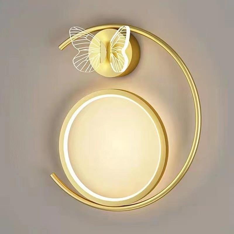 Goldene Wandlampe
